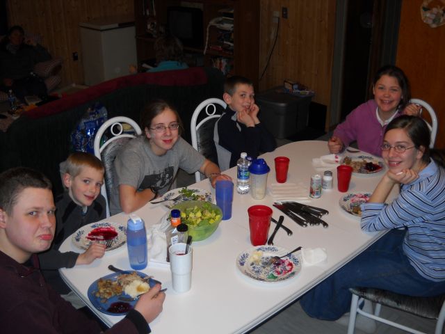 kids enjoying turkey dinner