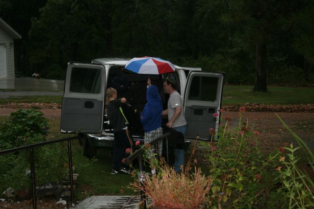 loading our van, in the rain